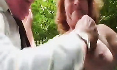 Mature Redhead Tart With Huge Tits Fucked Doggy In The Bushes