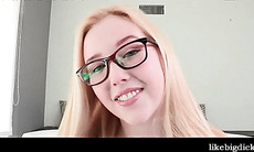 Blonde in glasses masturbates slick pussy