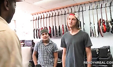 Blonde teen dude gets paid to play funny games in a store