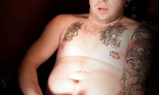 Tattooed punker solo masturbates his big hard cock