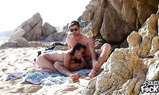 couple caught having sex on the beach