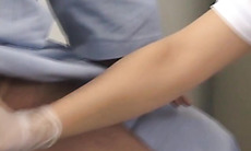 Japanese nurse showing handjob skills on a patient dick